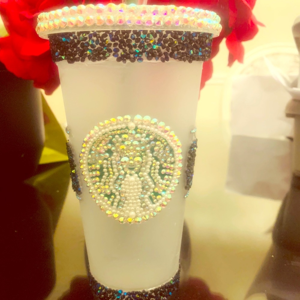 Bling and pearls decorated Starbucks water cup.